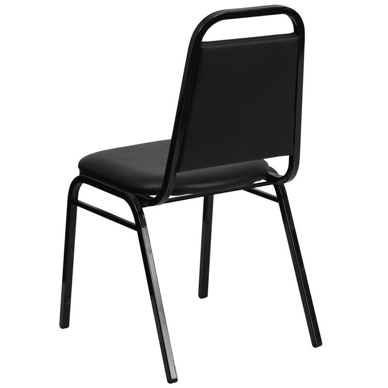 TBD 1001 Club series trapezoidal back stacking banquet chair with black vinyl and 1.5'' thick seat - black frame